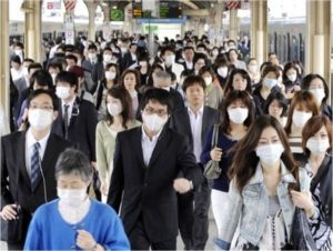 Once the State of Emergency was announced, nearly all of the Japanese public put in masks when exiting their homes. Photo Credit: (Associated Press / The Spokesman-Review)